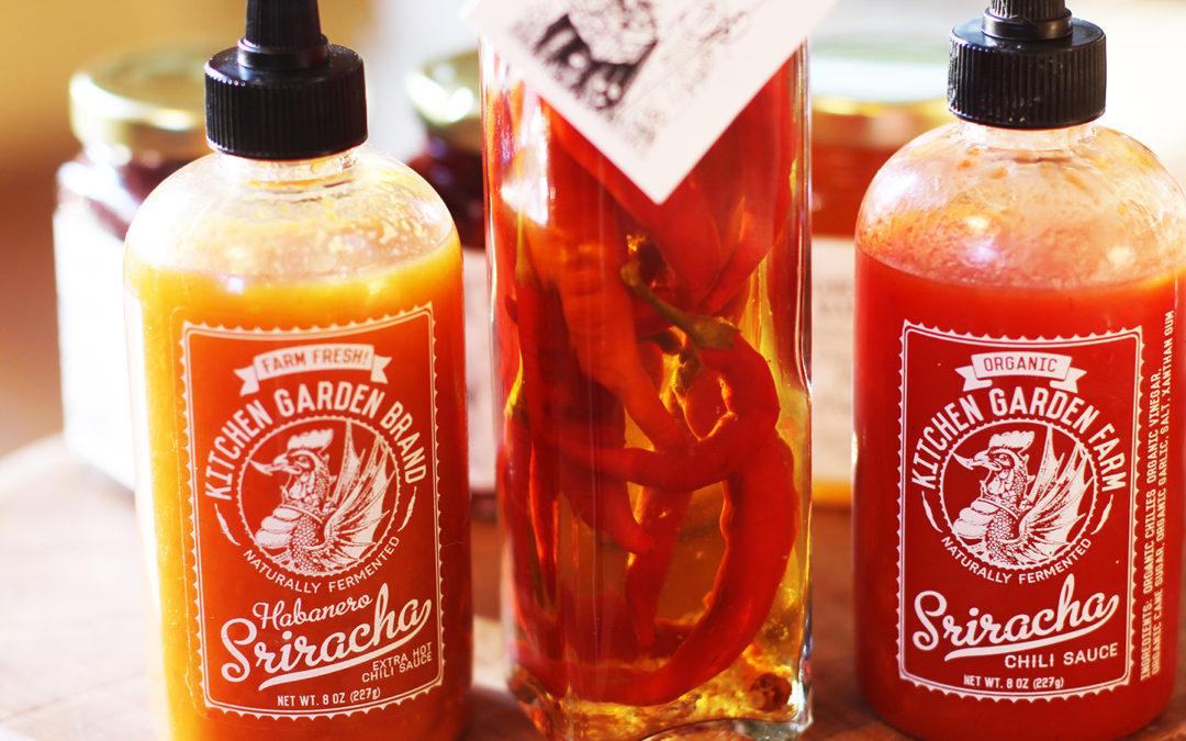 Bottles of Kitchen Garden Farm Sriracha